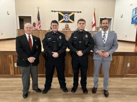 Police Chief Poe, Trevor Hudson, Steven Haynes, and Mayor Gates