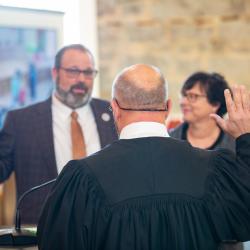 Councilmember Lincoln Moody reciting his Oath of Office