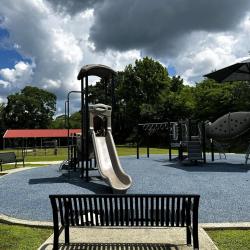James A. Cox playground with bench